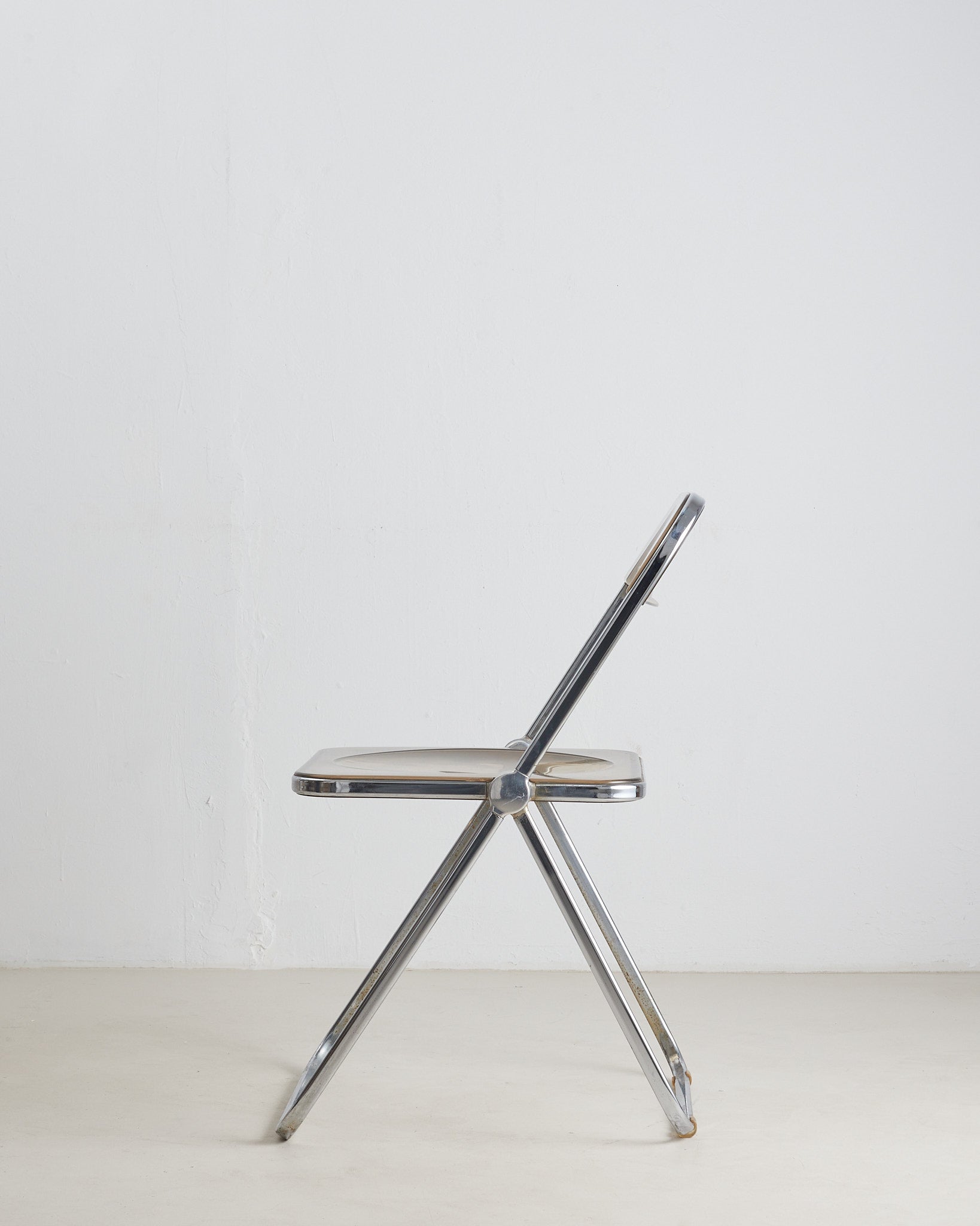 Plia Chair by Anonima Castelli